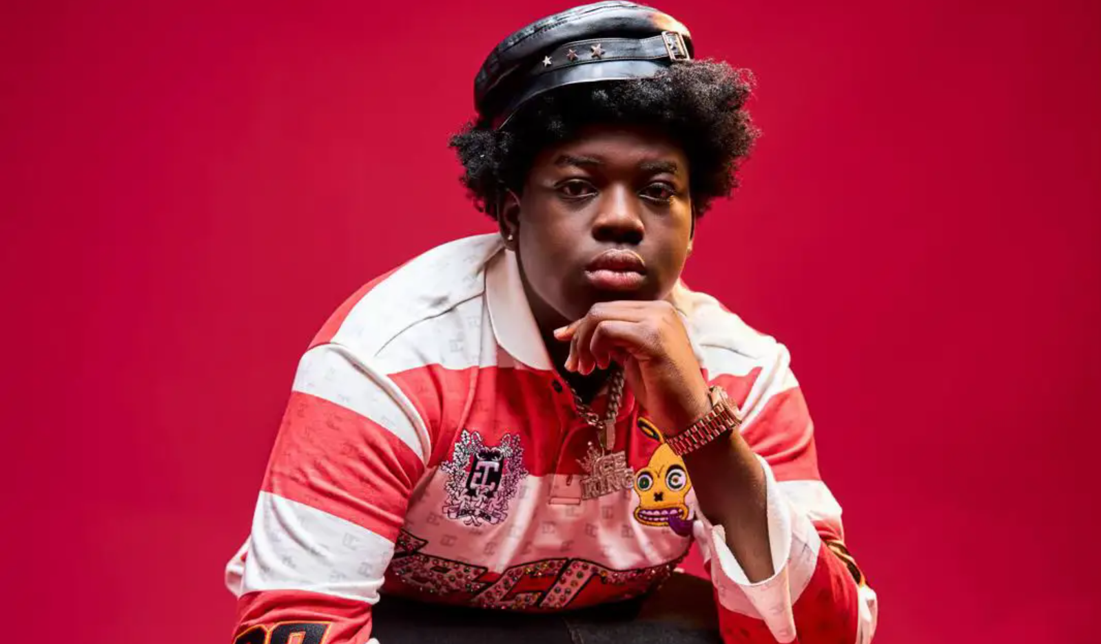 Iceking Ochacho portrait on a red studio background